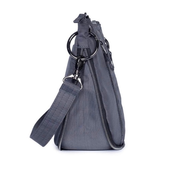 NWOT! Lug Swivel Convertible Crossbody Bag with a Classic Heart Pouch Included! - Picture 10 of 12